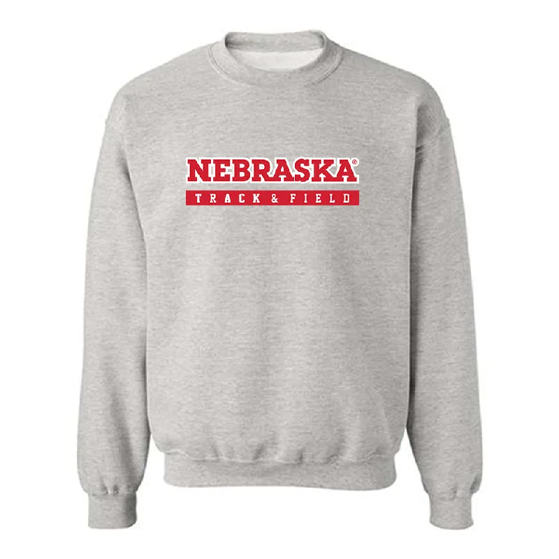 Nebraska - NCAA Women's Track & Field : Quincy Hubert - Classic Shersey Crewneck Sweatshirt Hoodie with Side Slits Relaxed Casual
